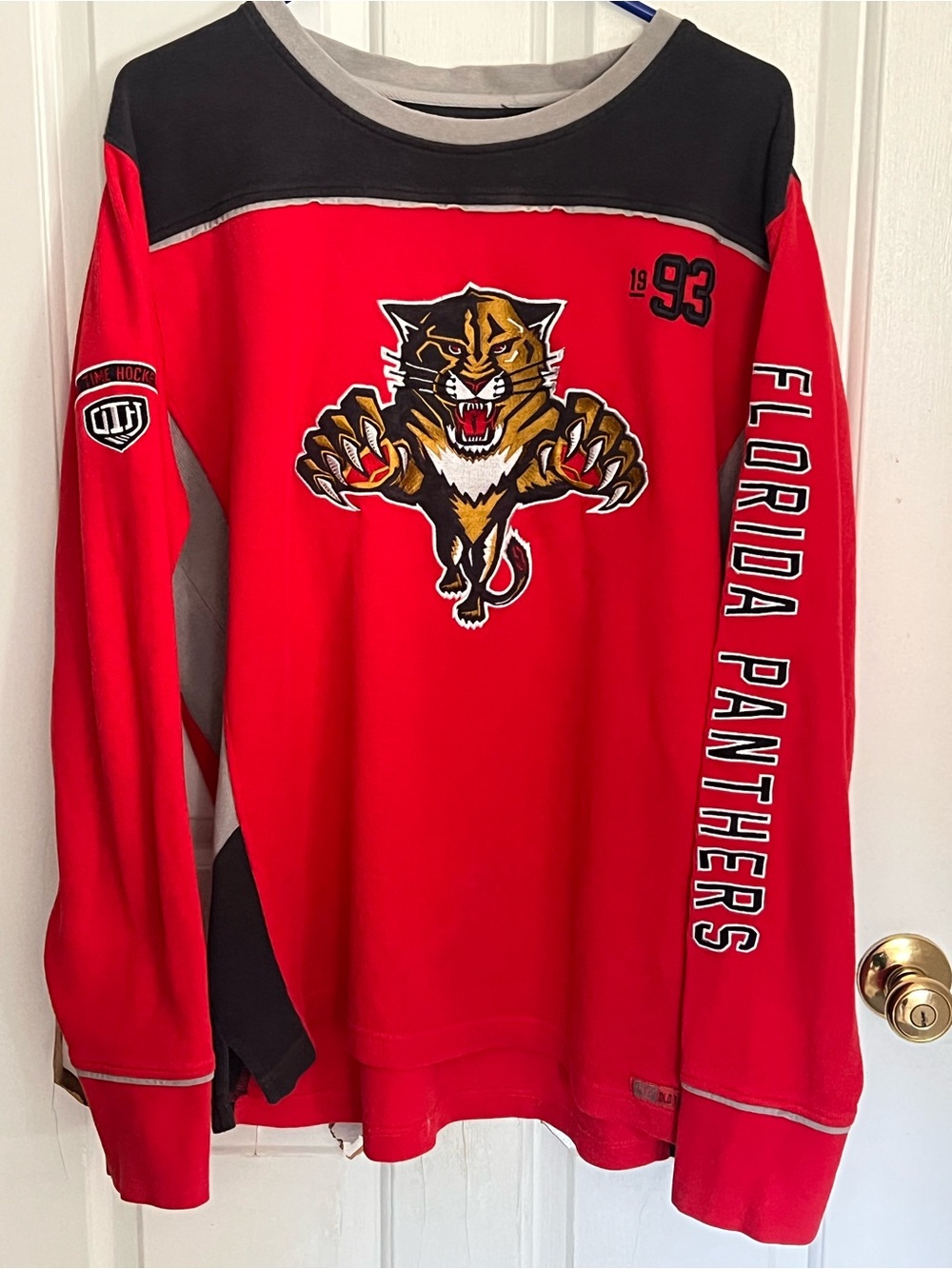 Vintage 1990s Starter/CCM-era Florida
Panthers long-sleeve red hockey warm-up